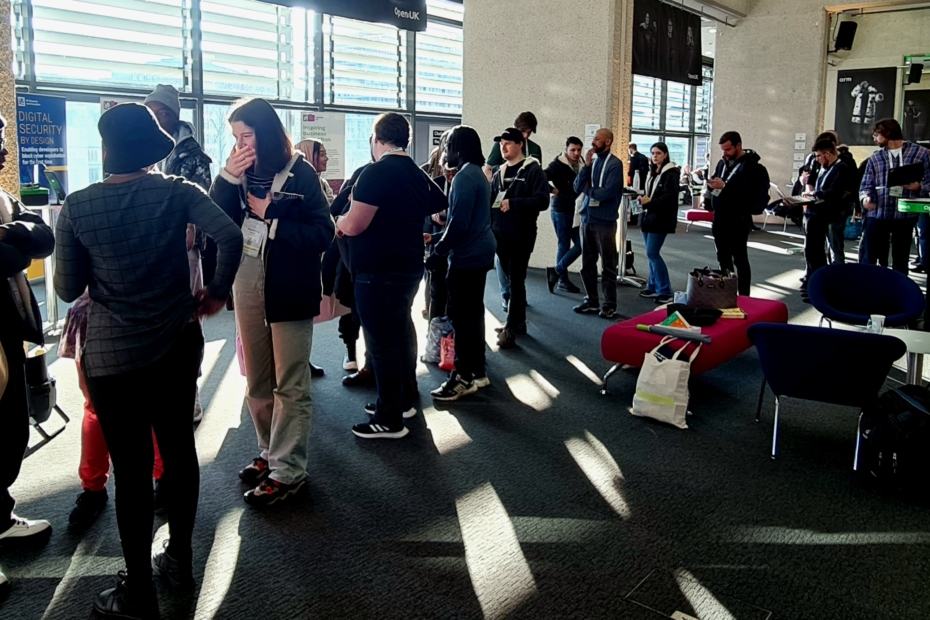 A queue of students in a large room